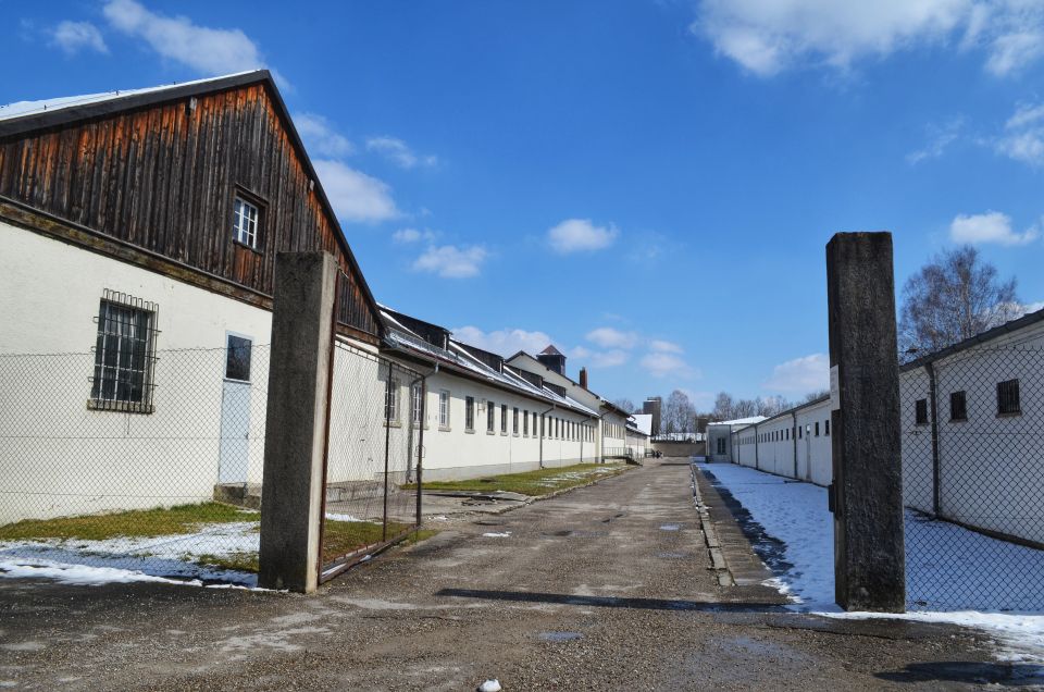 From Munich: Dachau Memorial Site Tour in Spanish - Getting from Munich to Dachau by train with an official guide