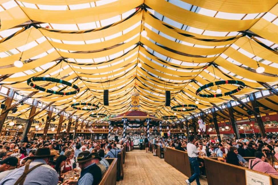 Munich: Oktoberfest Big Beer Tent Evening including table reservation - Timing, duration, and what you actually spend your day doing