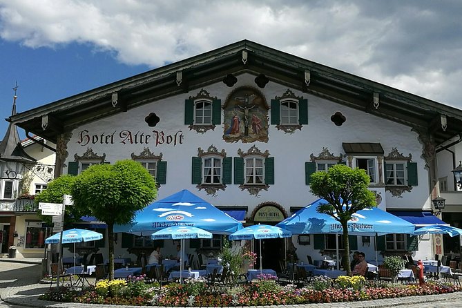 Munich private Car & Walking Tour incl. BMW World & River Surfers - The drive toward the castle heartland: Alps views with context