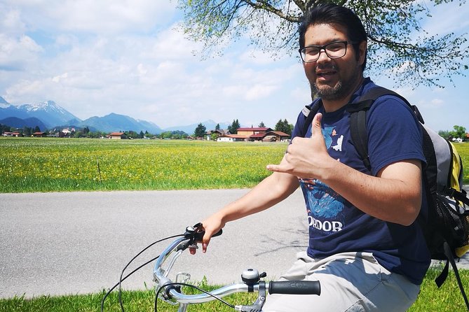 Neuschwanstein Castle by Bus Incl. Bike Ride or Hohenschwangau - Schwansee lake time: photos, optional swims, and a quick reset