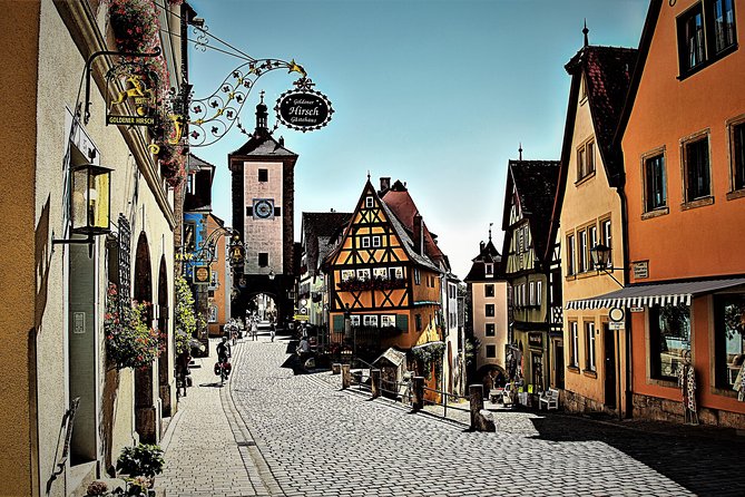 Romantic Road Highlights Private Day Trip from Munich - Harburg Castle: red-tiled roofs, parapets, and Wörnitz River views