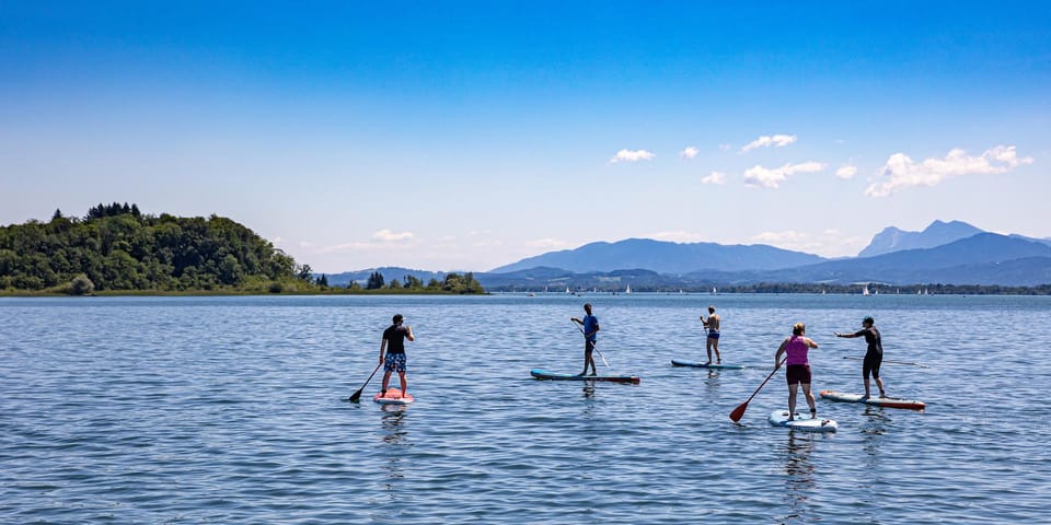 Stand Up Paddling at lake Chiemsee - Should you book this SUP session at Badeplatz Schraml?