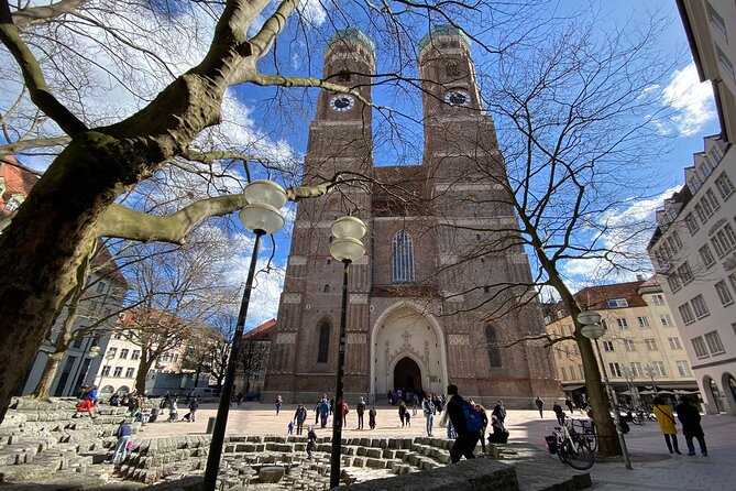 Ten Munich Old town Sights in a Private Express Walking Tour - New Town Hall Courtyard: The Staircase of Ages and Statue Meaning